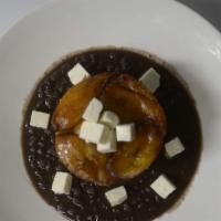 Pabellón Criollo · Shredded beef, rice & black beans, sweet plantain, fresh cheese.
