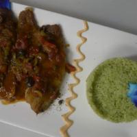 Pescado Veracruzano · Red snapper fillet in veracruz style sauce, olives, capers served with green rice (coconut, ...