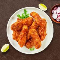 Bbq Blaze Tenders · Chicken tenders fried until golden brown before being tossed in barbecue sauce. Served with ...