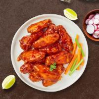 Buffalo Matador Wings · Fresh chicken wings fried and tossed in our buffalo wing sauce. Served with your choice of d...