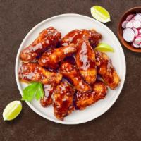 Grill Out Bbq Wings · Fresh chicken wings fried and tossed in classic BBQ sauce. Served with your choice of dippin...