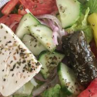 Greek · Lettuce, tomatoes, cucumber, onions, pepper, feta, olives.