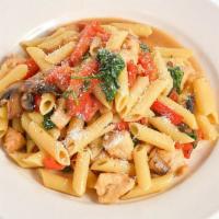 Tuscan Chicken · Herb grilled chicken with sautéed sweet red peppers, mushrooms and fresh spinach, garlic and...