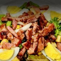 Cobb Salad · Mixed greens, turkey bacon, boiled eggs, avocado, tomato, onions, beans, cucumbers, corn, cr...