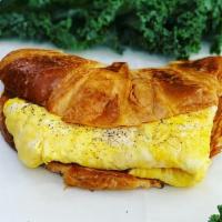 Croissant W. Eggs · Two scrambled eggs on fresh toasted Croissant .