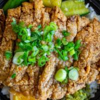 Fried Pork Chop Bian Dang · A marinated and pounded fried pork chop. Served w/ lu rou over rice w/ shredded mustard gree...