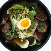 Beef Noodle Soup · A warm bowl of tender beef & noodles in a classic Taiwanese broth. Served w/ a soy egg, shre...