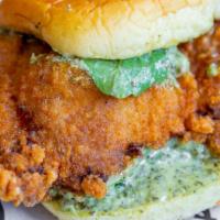 Fried Chicken Sandwich · Taiwanese fried chicken served on a potato roll & topped w/ fresh basil leaves & our homemad...