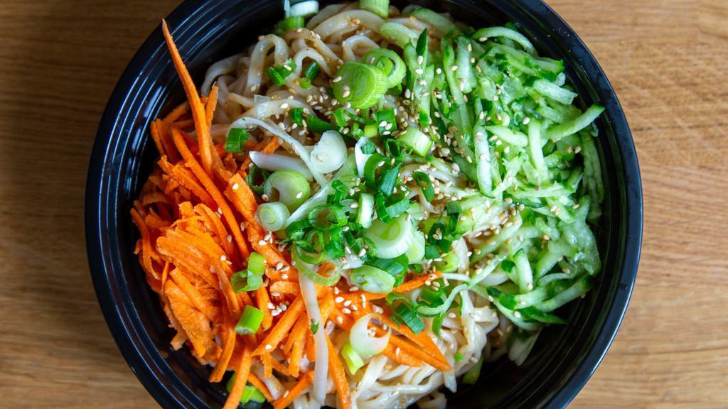 Sesame Garlic Cold Noodles · Chilled noodles tossed in a sauce made from garlic and sesame seeds and dressed with shredded Asian cucumbers, carrots and scallions.