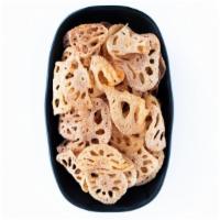 Lotus Root Chips · Made in-house.  Sliced lotus roots fried in small batches until crunch then salted.