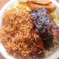 Jerk Chicken · Served with white rice or rice and peas, steam vegetables or salad and sweet plantain.