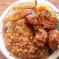 Stew Chicken · Served with white rice or rice and peas, steam vegetables or salad and sweet plantain.