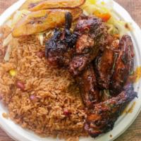 Jerk Chicken Wing · Served with white rice or rice and peas, steam vegetables or salad and sweet plantain.