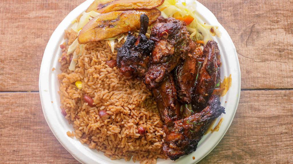 Jerk Chicken Wing · Served with white rice or rice and peas, steam vegetables or salad and sweet plantain.