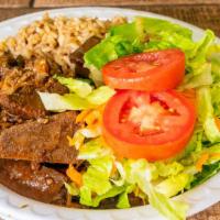 Jerk Pork · Served with white rice or rice and peas, steam vegetables or salad and sweet plantain.