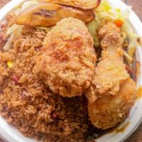 Fried Chicken · Served with white rice or rice and peas, steam vegetables or salad and sweet plantain.
