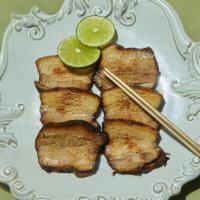 Chasu 차슈 · Braised pork belly kissed with a sear before being served. The star to the tonkotsu ramen.