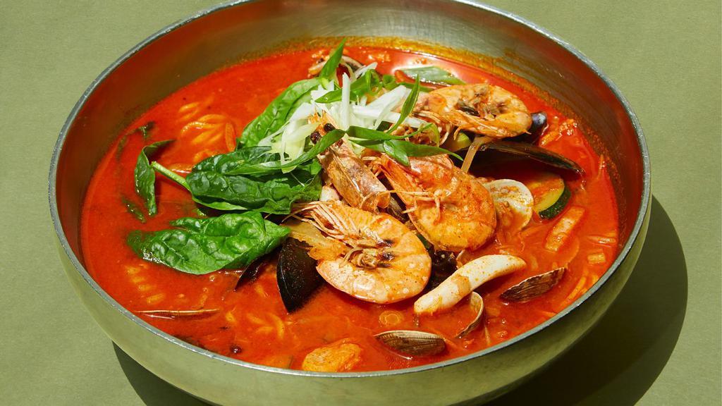 Jjam Bbong 짬뽕 · Iconic Spicy Seafood Noodle Soup with a heaping portion of Mussels, clams, prawns, shrimp, and squid. The secret is in the broth. The spice level is open to moderation.