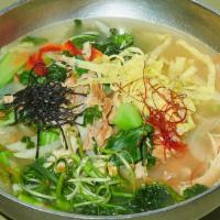 Knife Cut Noodles 칼국수 · Knife cut wheat noodles in a hearty non-spicy broth with potatoes, zucchini, onions, and sea...