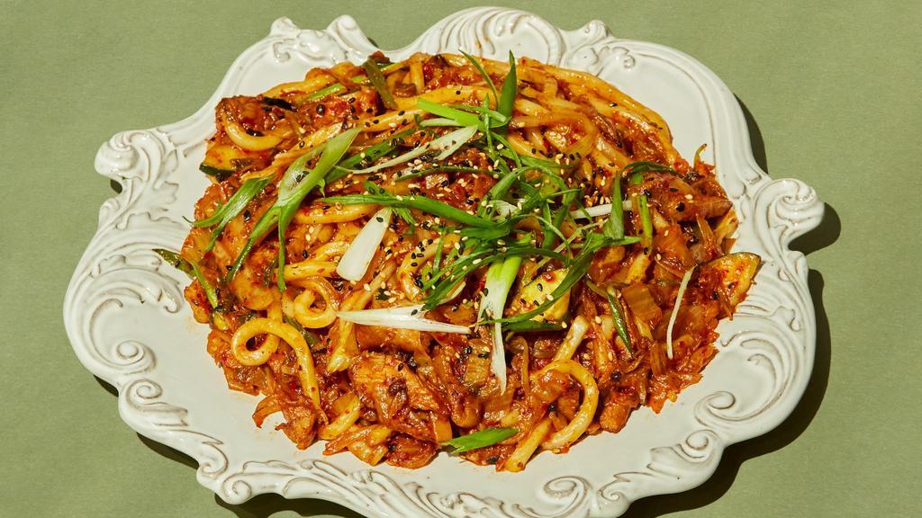 K-Rage 제육 우동 볶음 · Tempers flare with the heat of aged kimchi. A salty spice that simmers below the surface, stir-fried with udon noodles. Old-world Koreans would have this with pork-belly and tofu, but the protein choice is yours.