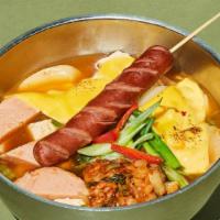 Frat Boy 부대라면 · A spin on the infamous army stew. Ramen with kimchi, spam, cheese, tofu and hot dog on a sti...