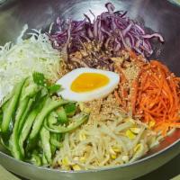 Sweet Heat Noodle Salad 쫄면 · Shredded cabbage, julienned carrots, cucumbers, blanched sprouts with egg served with a swee...