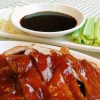 Peking Duck · Served with scallions and pancake.