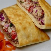 Pockets · Chicken or tuna for an additional charge. Creamy salad with chicken or tuna served in a pita...