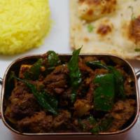 Coconut Beef Fry & Bread Of Choice · Beef roast. Choice of bread, naan, kerala paratha and pita. Comes with kabsa rice and salad.