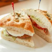 Grilled Chicken Foccacia · Roasted peppers, fresh mozzarella, pesto mayo, and balsamic.