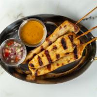 Chicken Satay · A13 chicken satay grilled marinated chicken skewers with peanut sauce and cucumber sauce.
