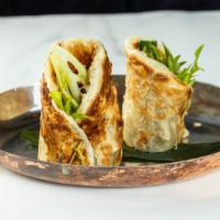 Duck Roll · Crispy duck, vegi wrapped in soft tortillas with special tamarind sauce.