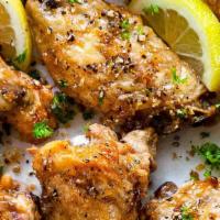 Lemon Pepper Wings · Eight seasoned bone-in or boneless wings fried to perfection and tossed in our signature Lem...