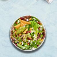 Taco Loco Salad · Romaine lettuce, diced tomatoes, red onion, corn, crushed tortilla chips and vegan ground be...