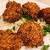 Falafel · Fried chickpeas with special Mediterranean seasoning served with tahini sauce and hummus