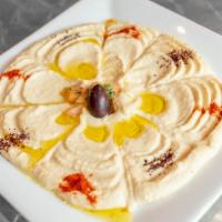Hummus · Pure chickpea with sesame seeds extra virgin olive oil with lemon juice