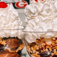 Longford’S Classic Sundae  · Choice of 2 Scoops, 1 Wet Topping, 1 Dry Topping. Includes whipped cream and cherry