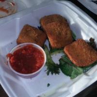 Fried Mozzarella · Fresh mozzarella wedges, breaded and pan seared to a golden brown. Served with marinara sauce.