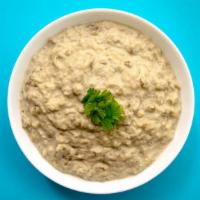 Baba Ghanouj Dip · Smoky, roasted eggplant puréed with tahini and garlic and finished with a generous drizzle o...