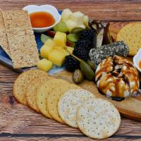 The Cheesy Happyboard (Vegetarian) · Burrata with Balsamic Glaze, Manchego, Herbed Goat Cheese, Cheddar, Seasonal Fruits, Dried D...