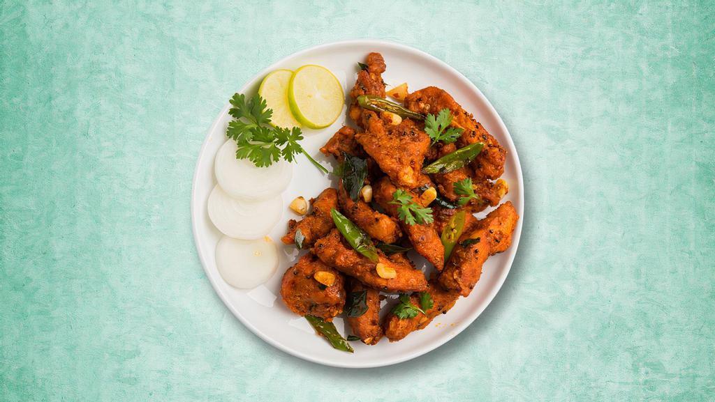 Firecracker Chicken  · A spicy and lip-smacking snack made with wok tossed chicken fritters smothered in spicy curry sauce.
