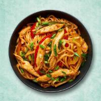 Wok Tossed Chicken Noodles · Thin noodles are tossed with fried chunks of chicken,  veggies and sauces on high flame to m...