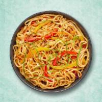 Wok Tossed Veg Noodles · Thin noodles are tossed with veggies and sauces on high flame to make this Indo Chinese deli...