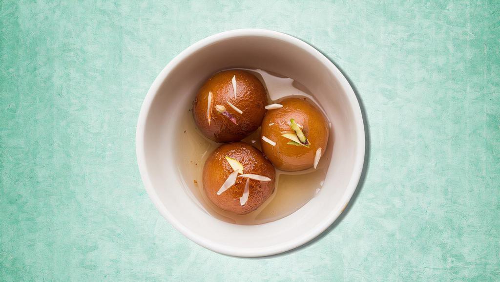Cafe Gulab Jamun  · Village cheese dumplings deep fried and steeped in a cardamom infused sugar syrup