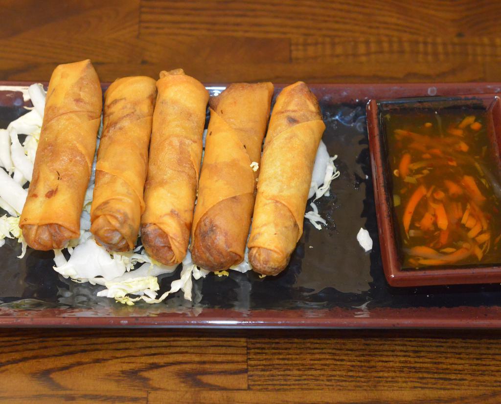 Vegetable Por-Pier-Tod (Best Seller) · Vegetables and bean thread in rice paper deep fried, served with sweet and spicy sauce.