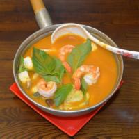Tom Yum Goong (Best Seller) · Spicy and sour lemon grass soup with shrimp and mushrooms
