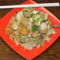Kao Pad Puck Ruam Mit · Fried rice with mixed vegetables in a light seasoning sauce