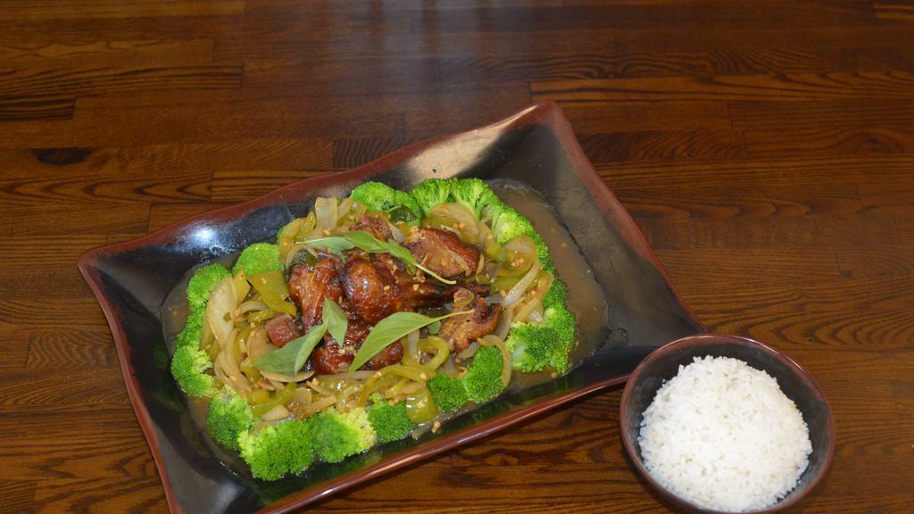 Duck Special · Crispy roasted duck with a choice of tamarind sauce, panang sauce,red curry sauce, green curry sauce or basil sauce.