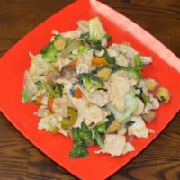 Gai Pad Puck Ruam Mit · White meat chicken, mixed vegetables and dried mushrooms stir fried in a chili yellow bean s...