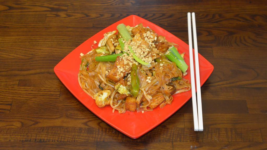 Pad Thai Puck (Best Seller) · Rice noodles stir fried with mixed vegetables & ground peanuts - a traditional dish